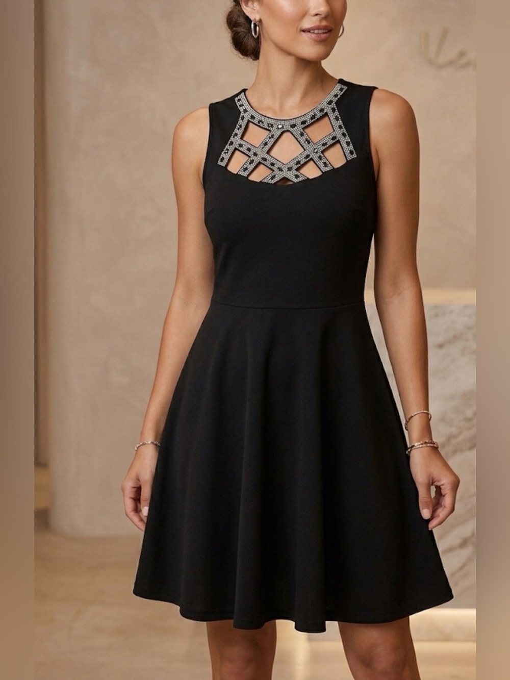 Elegant Black Sleeveless A-Line Dress with Embellished Neckline